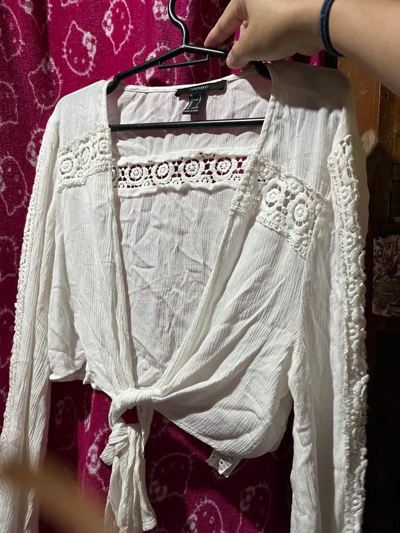 Forever21 Ivory White Front Tie Crop Top (Category: Others Tops) located in Quezon City. Submitted by mae_payitforward (Listing ID 1182083086, Image 1). Description: Used it as a cover and spare for my maternity shoot As-is where-is Good condition .