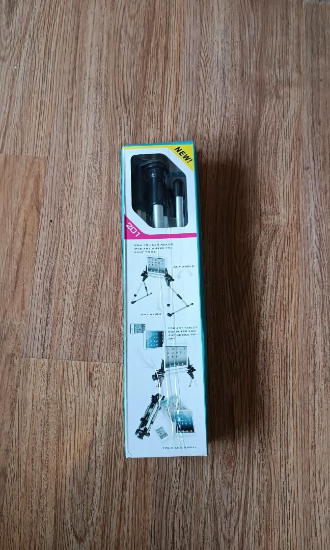 Smart phone tablet foldable stand holder (Category: Mounts & Holders) located in Manila. Submitted by jl_yu (Listing ID 1181932997, Image 2). Description: For sale: Brand new cellphone/tablet foldable stand holder -perfect for seniors and PWD -will fit 3inches to 10.5 inches devices -foldable, adjustable height -very light and sturdy location: pickup visayas ave qc. shipping can also be arranged 09l6-745-l867.