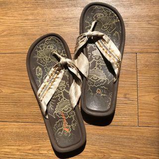 Brown flip flops beach sandals