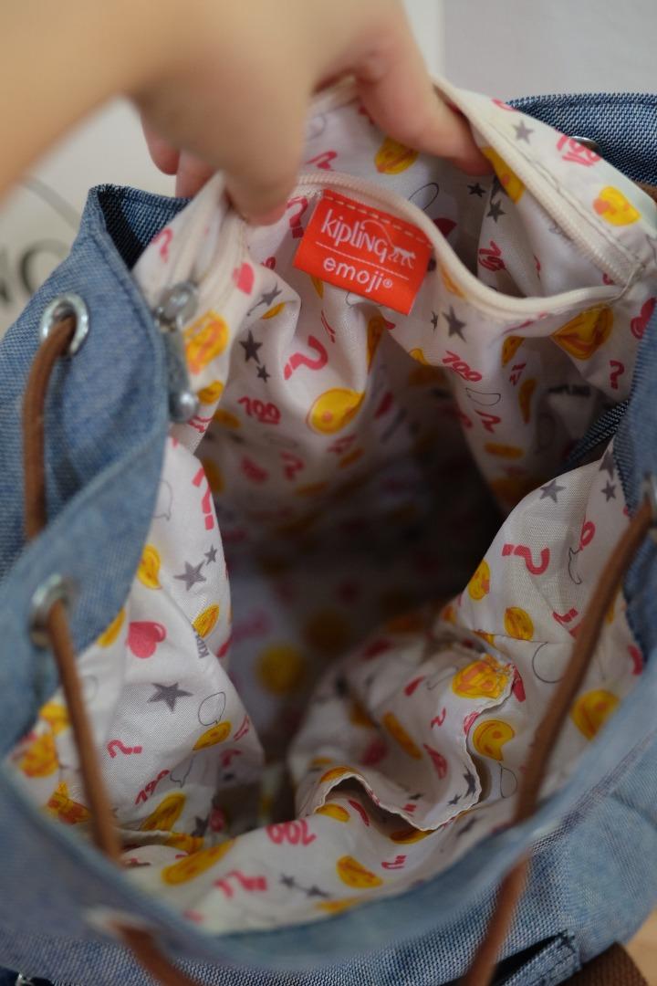 Kipling store emoji backpack