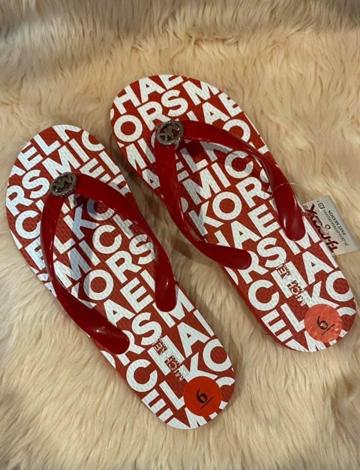 Michael kors flip flops red hot sale