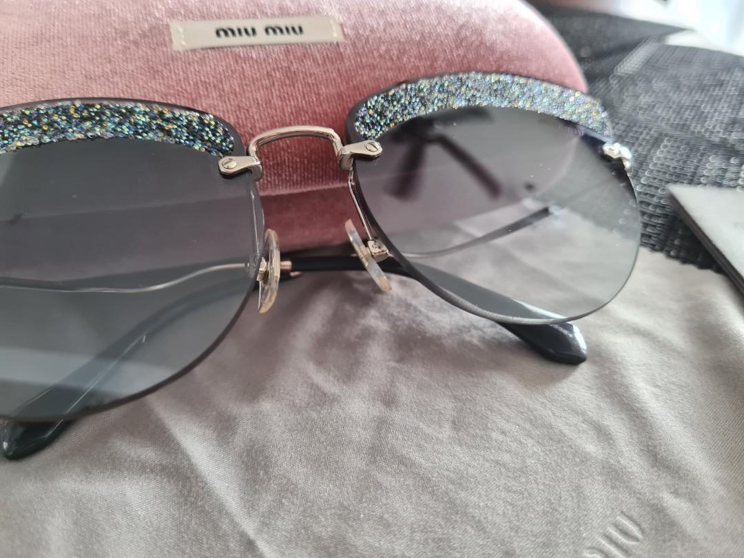 Miu miu store noir glitter sunglasses