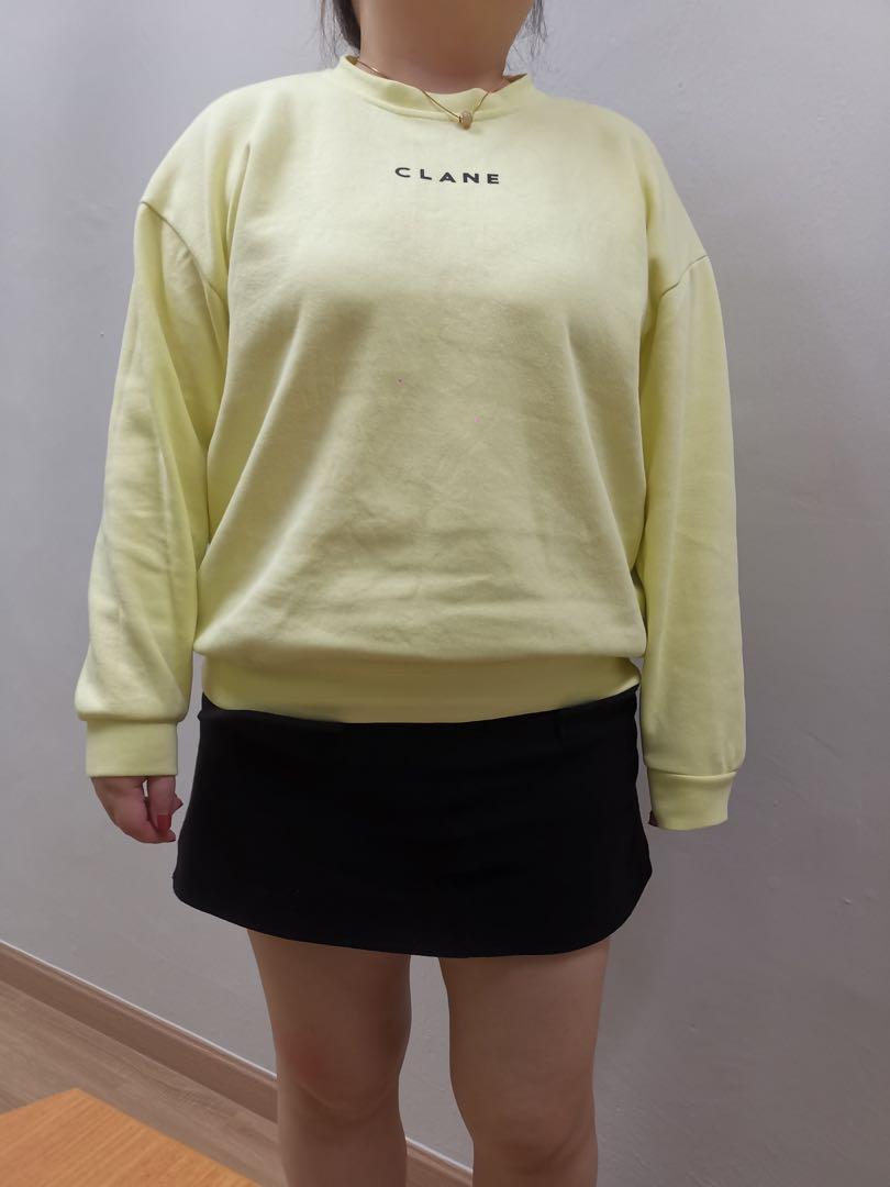 oversized yellow sweater