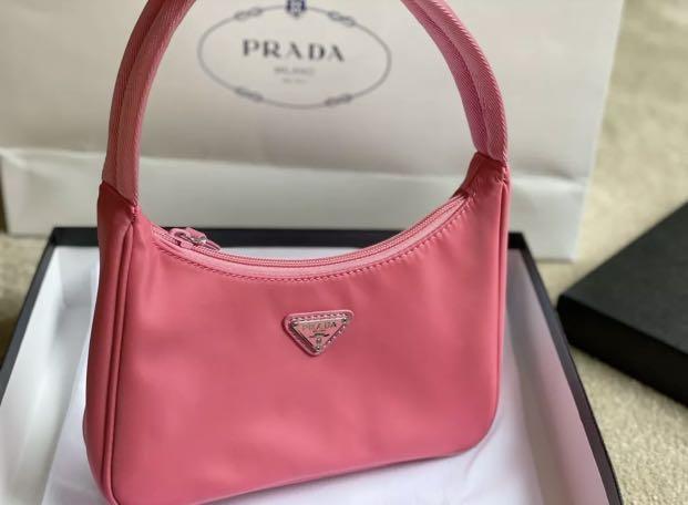 Prada Nylon Baguette Bag (Category: Luxury Bags & Wallets) located in Lucena. Submitted by fashioncult.ph (Listing ID 1176449216, Image 2). Description: Prada Nylon Baguette Bag 👉🏻 Brandnew w/dustbag & cards 👉🏻RFS: gift from my birthday too many bags (decluttering) 👉🏻1:1 clone 👉🏻NGA 👉🏻low ballers & rude buyer will automatically blocked 👉🏻MOP: BDO/ GCASH payment 👉🏻very cute & spacious 👉🏻shipping fee will be shouldered by the buyer 