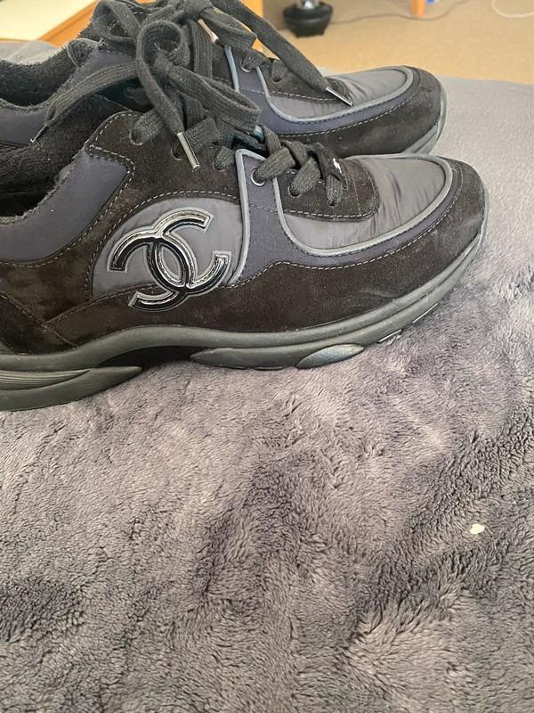 Chanel runners triple black (Category: Sneakers) located in Caloocan City. Submitted by morganicasuzie-30507 (Listing ID 1176702473, Image 1). Description: Chanel runners triple black worn no more than 3 times bought from selfridges Authentic I have the box dust bag and bag Message with any questions.