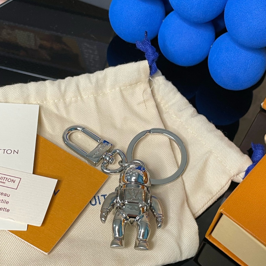 Louis Vuitton Limited Spaceman Keychain, Luxury, Accessories on Carousell