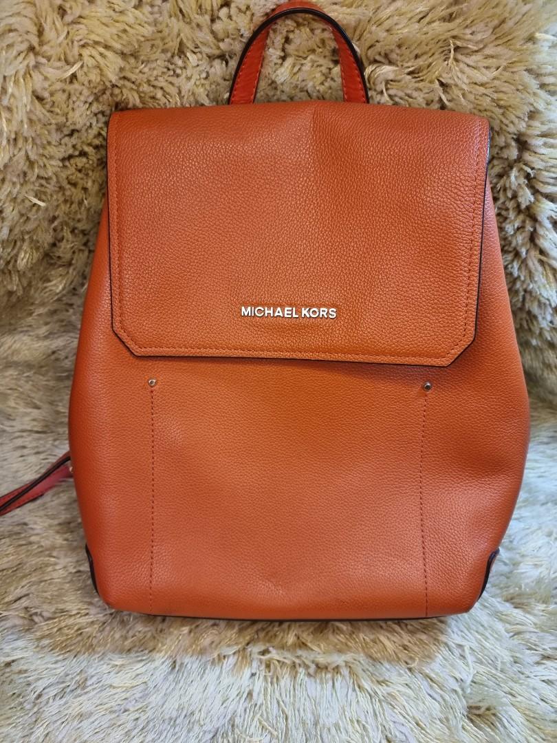 Original Michael Kors Back Pack (Category: Backpacks) located in Makati City. Submitted by AL_ORIGINALS (Listing ID 1176751088, Image 1). Description: 💯 Original Back Back 8.5/10 Minimal Rubs, Sign of usage with pen mark outside but doesn't effect the appearance of the bag. Super ganda you can pair it with my orange wallet also michael kors. Manage your expectations since this was used item. Best for OOTD Negotiable if pair with Michael kors Con