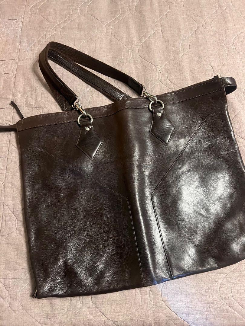 Oversized tote leather bag (Category: Luxury Bags & Wallets) located in Quezon City. Submitted by jules0702brand (Listing ID 1176651314, Image 2). Description: All cowhide leather oversized tote bag in dark coffee brown color. P.S. seller will hold SF .