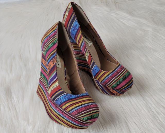 Steve Madden Platform Multicolor Rainbow Tribal Wedges (Good Condition) (Category: Wedges) located in Quezon City. Submitted by rosave (Listing ID 1176671005, Image 1). Description: STEVE MADDEN “Pammyy” Platform Wedge Pump Heels multicolored rainbow festival tribal print -5.25”heel -1.25” platform -9.5’’ insole Womens size 7 M See photo for condition The pair in photos are the exact pair you will receive Used rarely in the past for a few photosh