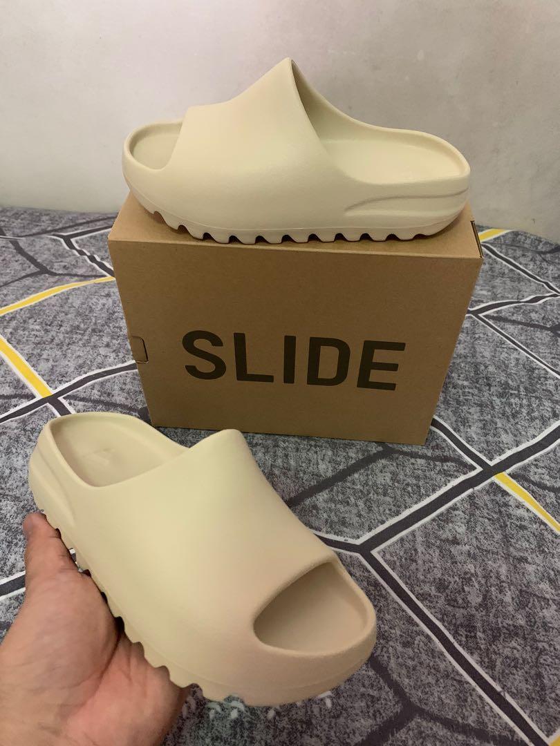 US 3Y) Adidas Yeezy Slides 'Bone' Kids, Men's Fashion, Footwear, Flipflops  and Slides on Carousell