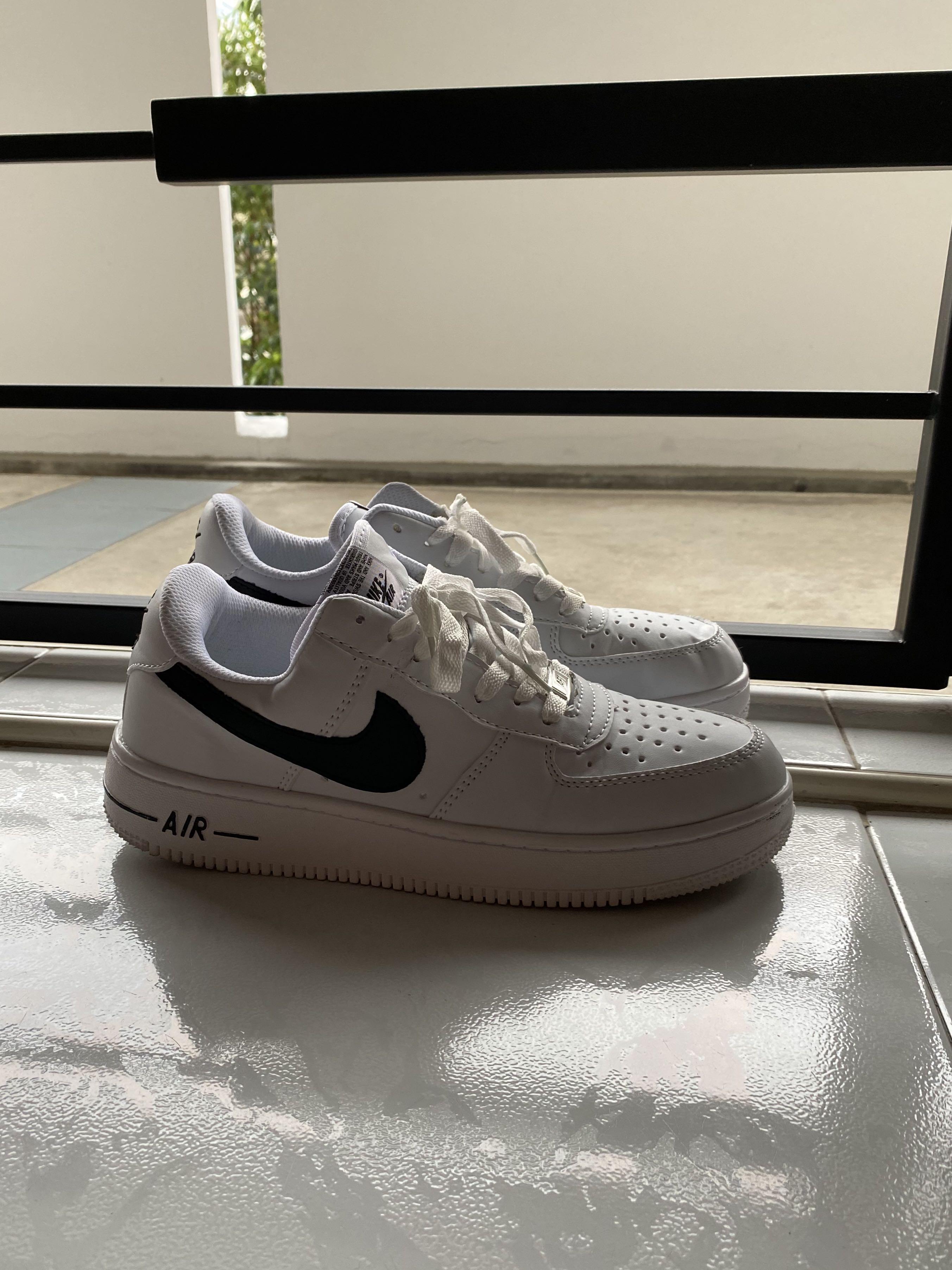 White Nikes Black Tick