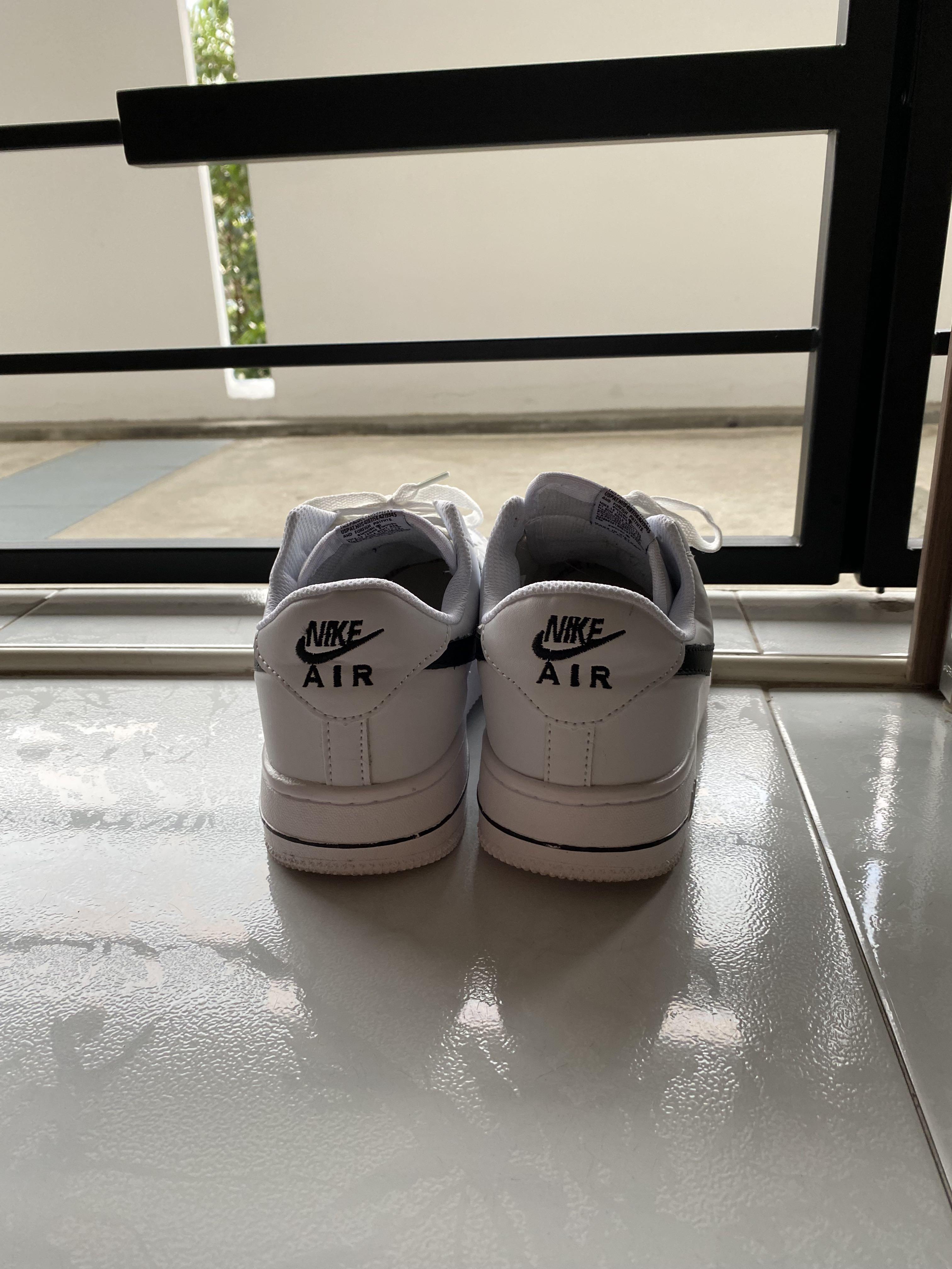 White shoes with black tick