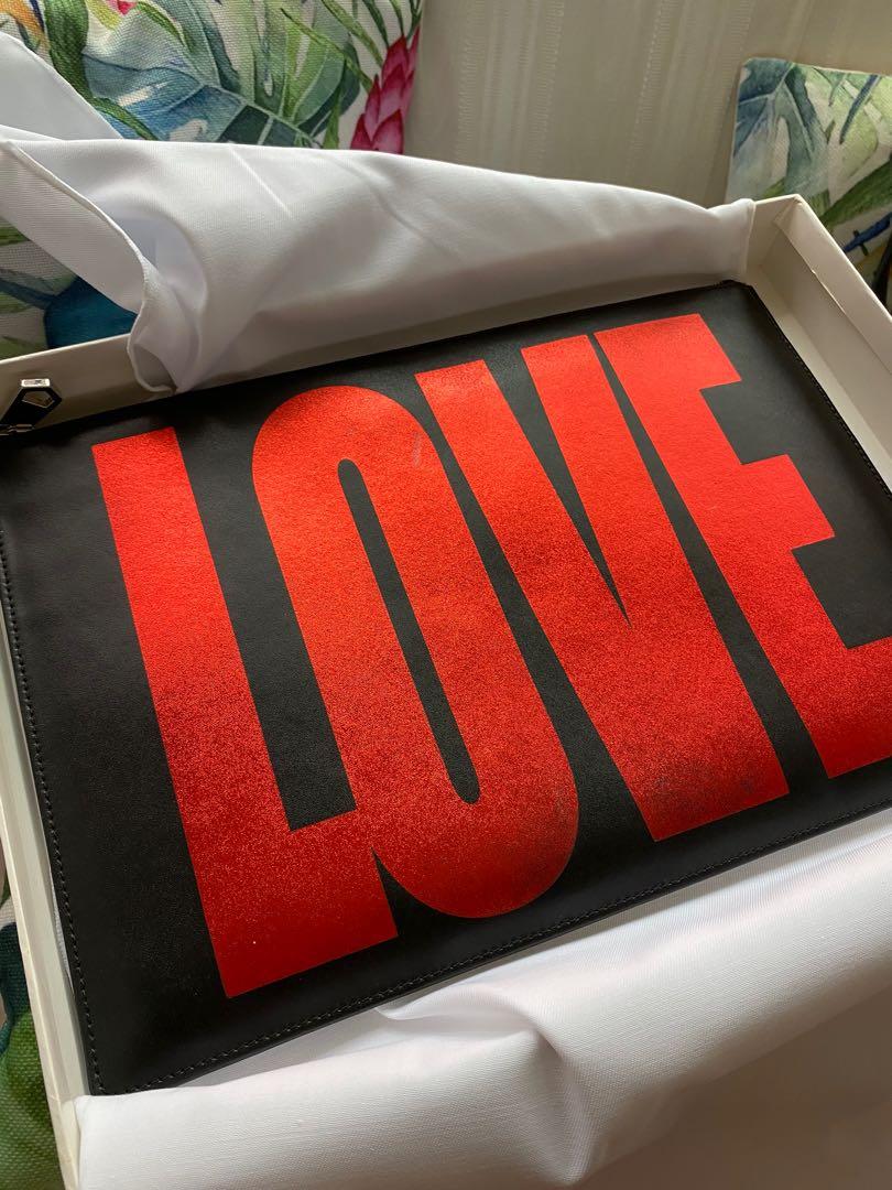 Givenchy envelope clutch LOVE (Category: Luxury Bags & Wallets) located in Quezon City. Submitted by cheskakim (Listing ID 1176831184, Image 1). Description: Original price is 38800. This is a good deal..