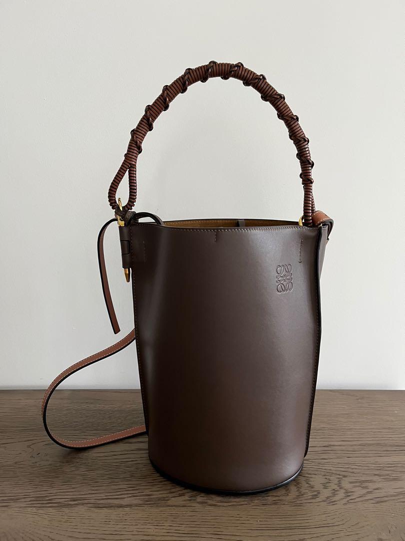 Pavilion KL - PAVILION KUALA LUMPUR SHOPPING CONCIERGE Loewe Anagram Gate  Bucket Bag In Natural Calfskin (Avocado Green/Tan) Price: RM7,800.00 A  streamlined bucket style shoulder bag decorated with a perforated Anagram on