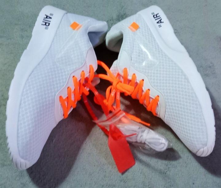 Nike tanjun x off white discount