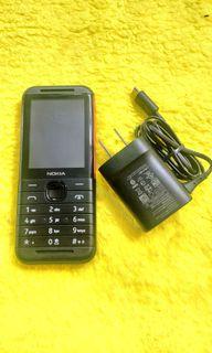Nokia keypad phone 5310 original w/ charger original battery