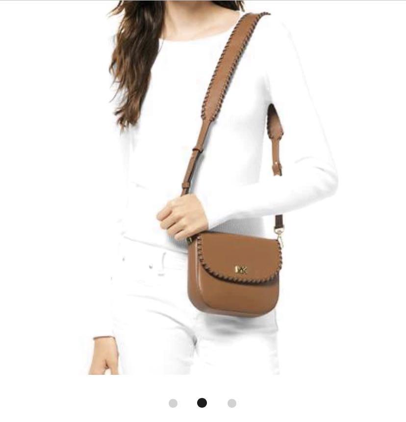 Half dome discount crossbody mk