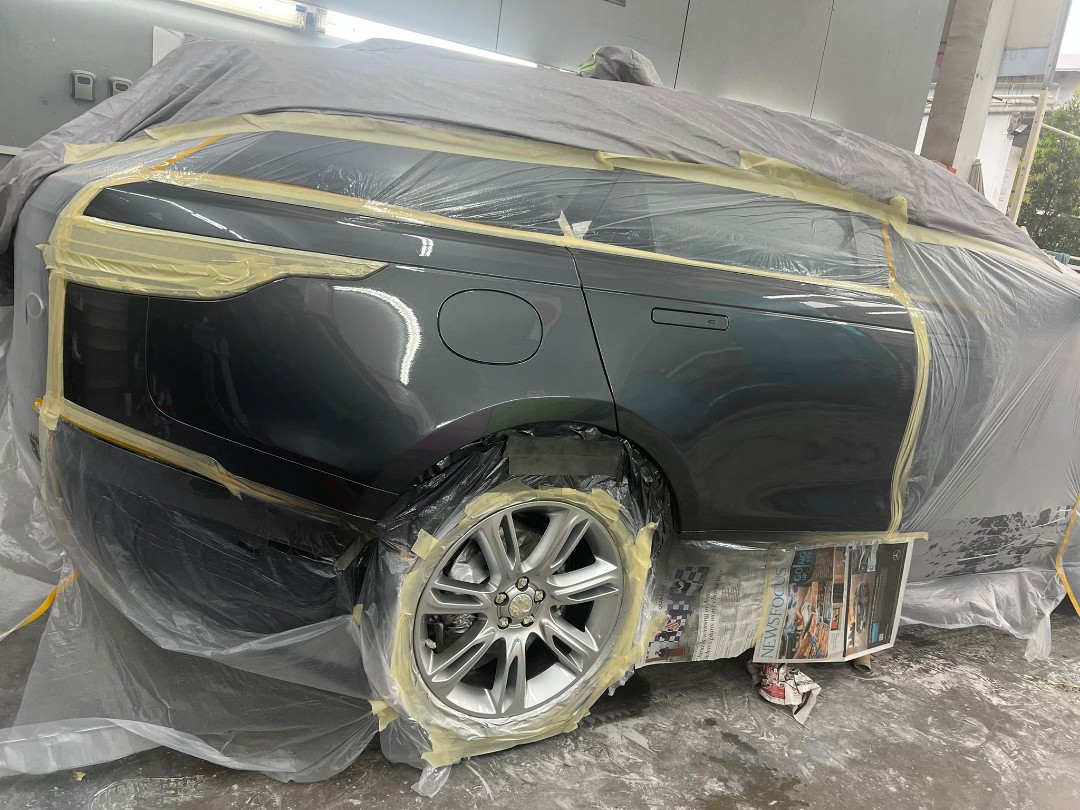 Spraypainting panel beating dent scratch accident repair spray paint