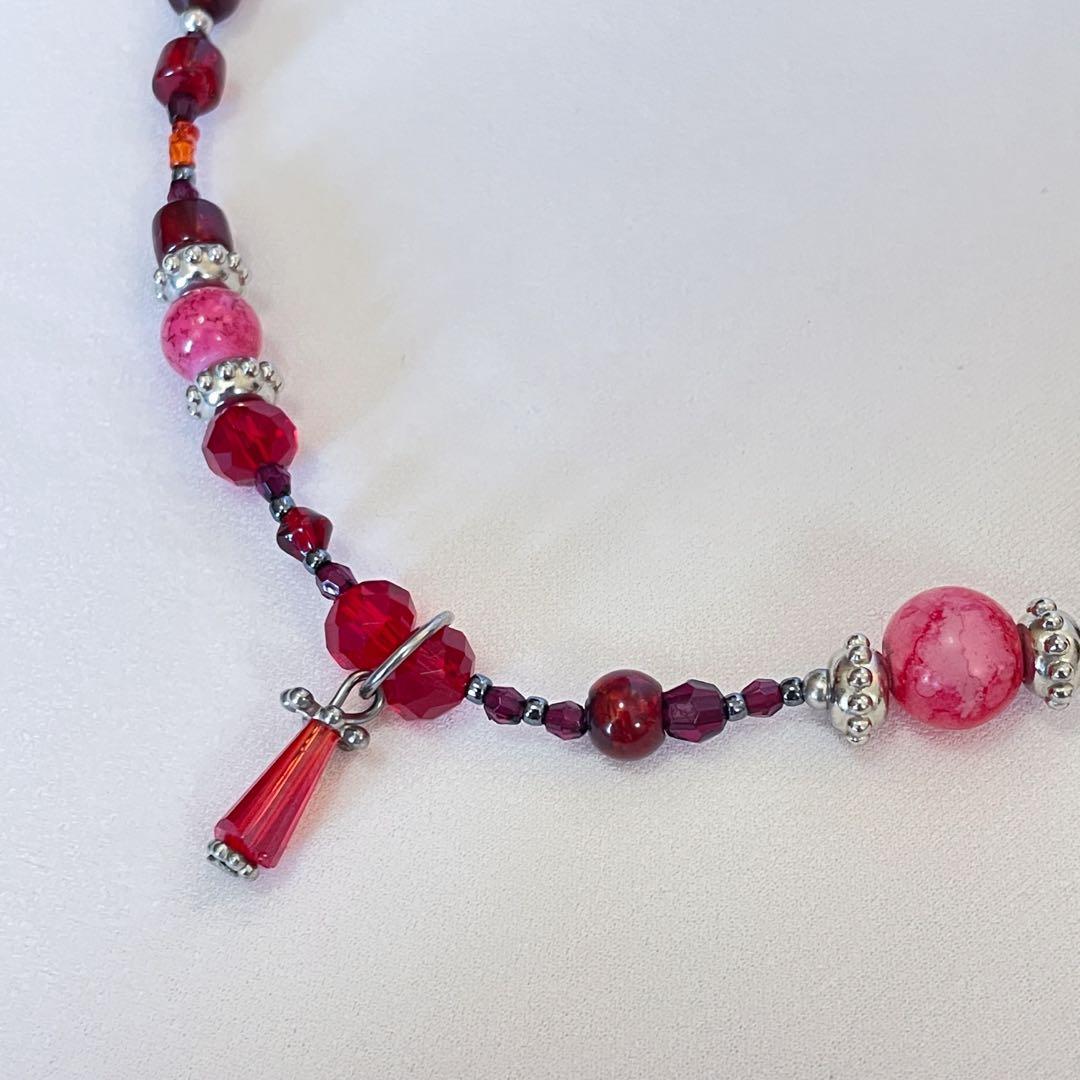 Red glass necklace shop