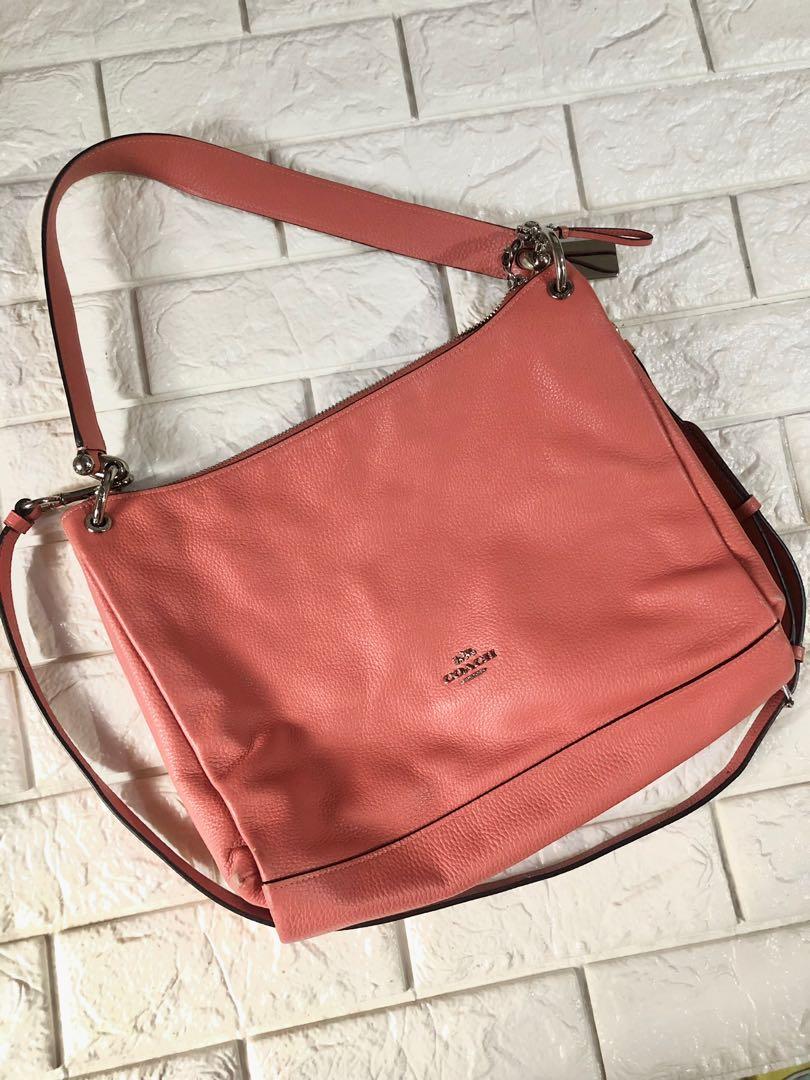 Authentic 2- way Coach Bag Salmon Pink (Category: Luxury Bags & Wallets) located in Mandaluyong City. Submitted by ricaley (Listing ID 1177031731, Image 1). Description: with rubs on corners and sought scratch in front (not visible) sf c/o buyer.