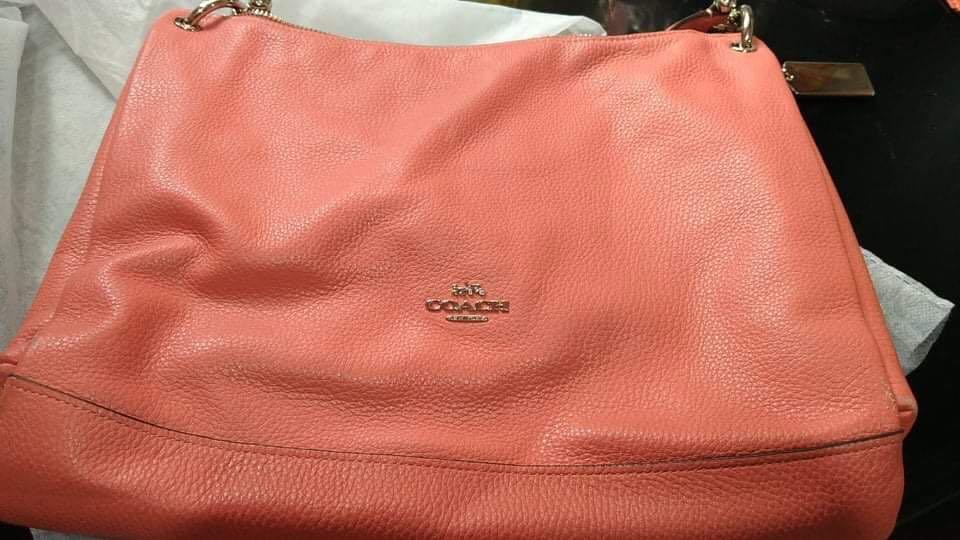 Authentic 2- way Coach Bag Salmon Pink (Category: Luxury Bags & Wallets) located in Mandaluyong City. Submitted by ricaley (Listing ID 1177031731, Image 2). Description: with rubs on corners and sought scratch in front (not visible) sf c/o buyer.