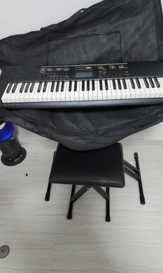 Casio keyboard CTK 2400 with stand, stool, music score holder and bag