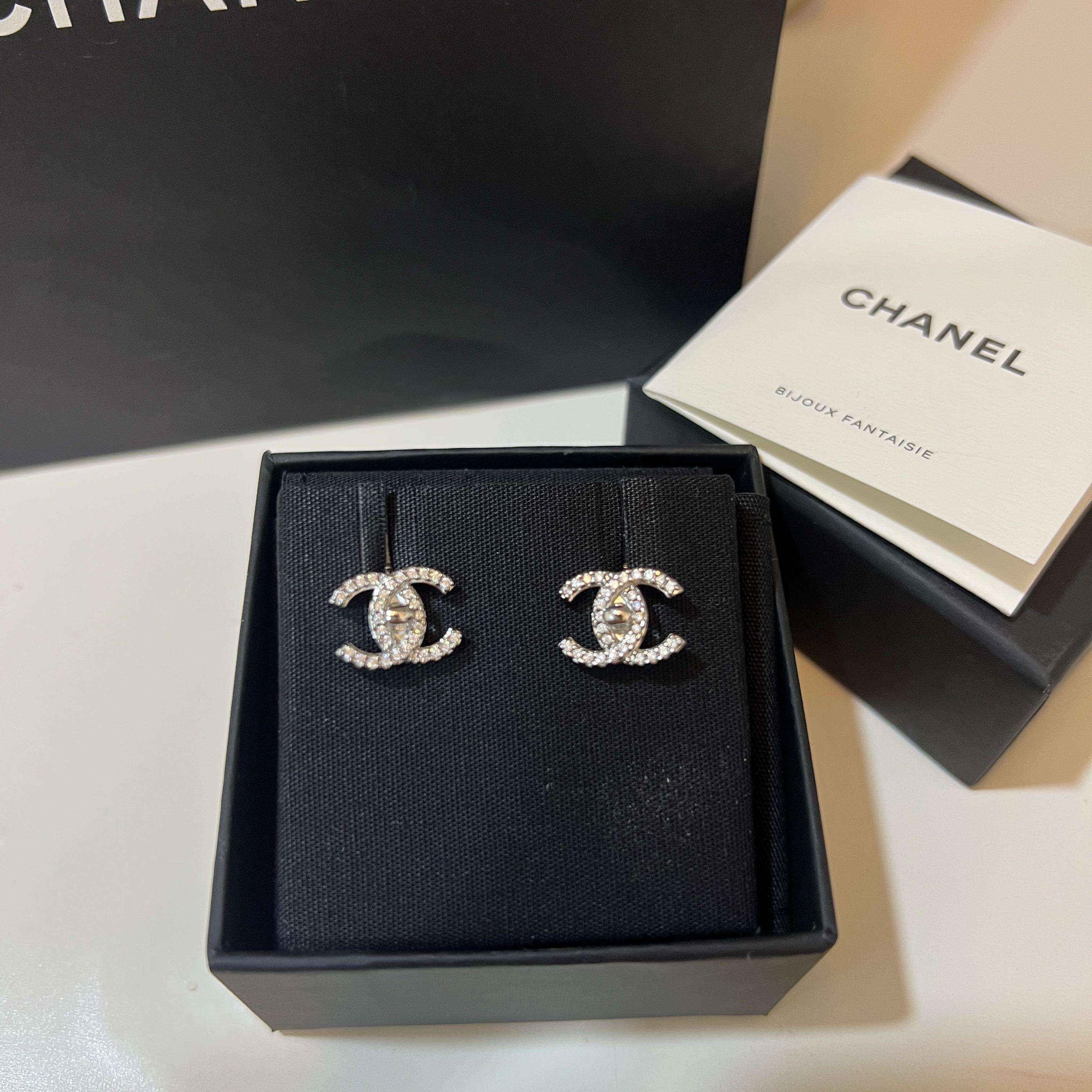 Chanel logo hot sale earrings price