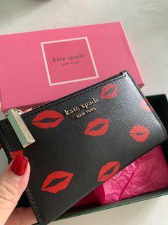 Kate Spade Kisses faux-leather slim bifold wallet