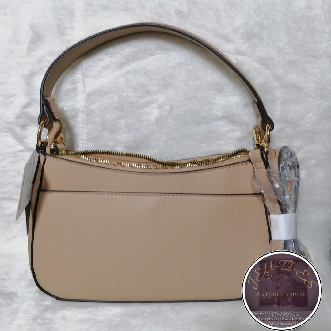 Nanette Lepore 2 Way Bag (Category: Shoulder Bags) located in Taytay. Submitted by jeyties (Listing ID 1177170790, Image 2). Description: Original Nanette Lepore Bag With removable adjustable sling strap Magnetic back pocket Gold Hardware.