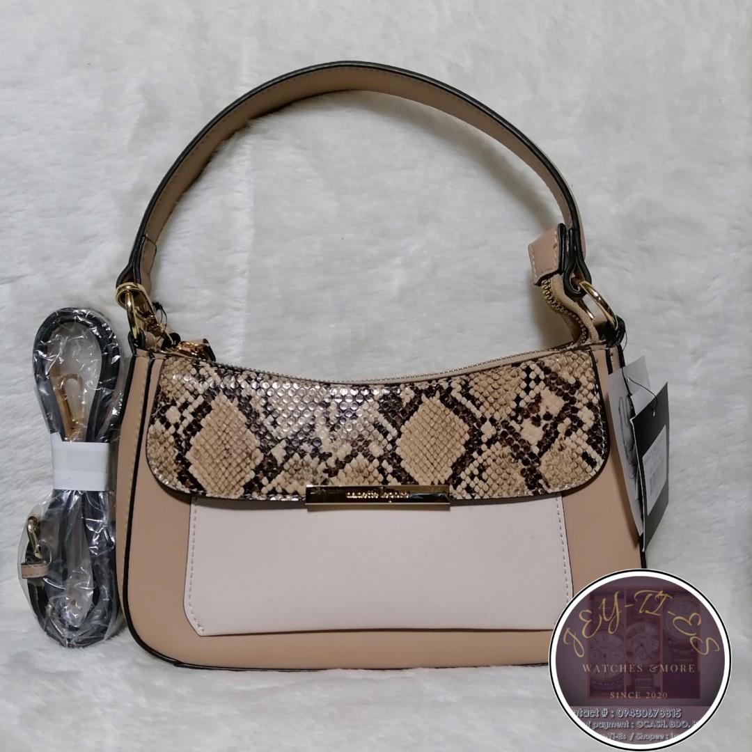 Nanette Lepore 2 Way Bag (Category: Shoulder Bags) located in Taytay. Submitted by jeyties (Listing ID 1177170790, Image 1). Description: Original Nanette Lepore Bag With removable adjustable sling strap Magnetic back pocket Gold Hardware.