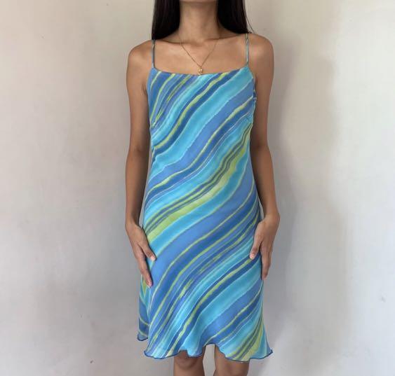 Slip Dress (Category: Dresses) located in Manila. Submitted by secondsbyem (Listing ID 1177034424, Image 1). Description: Multi colored stripes chiffon slip dress - S-M - Bust 15", Length 34.5" - Lined, no adjustable straps .