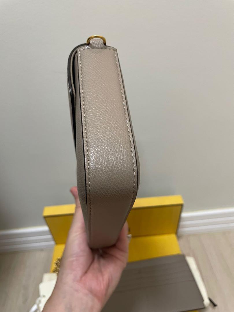 Fendi wallet on chain with removal pouch (Category: Luxury Bags & Wallets) located in Taguig. Submitted by dangruizdee (Listing ID 1177437176, Image 3). Description: Unused condition Grained leather Comes with gold chain, 2 removable pouch, dustbag and box Same size/look as LV Felicie.