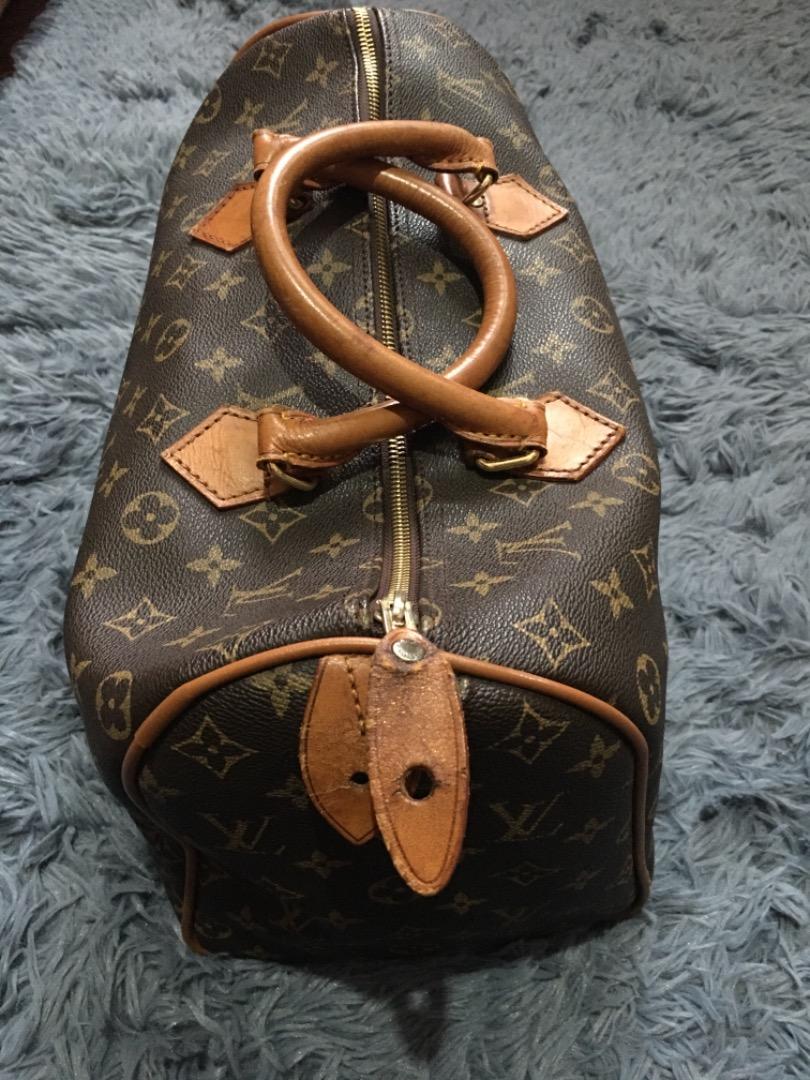 LV Speedy 35 coded (Category: Luxury Bags & Wallets) located in Puerto Princesa. Submitted by Megz2303-56298 (Listing ID 1177340666, Image 3). Description: Speedy 35 LV searchable code well loved and in still in good condition handles and piping are all intact and in good condition with signs of use (see pictures of zipper leaf) L: 13 in, H: 9 in, W: 7 in note: zipper leaf needs repair .