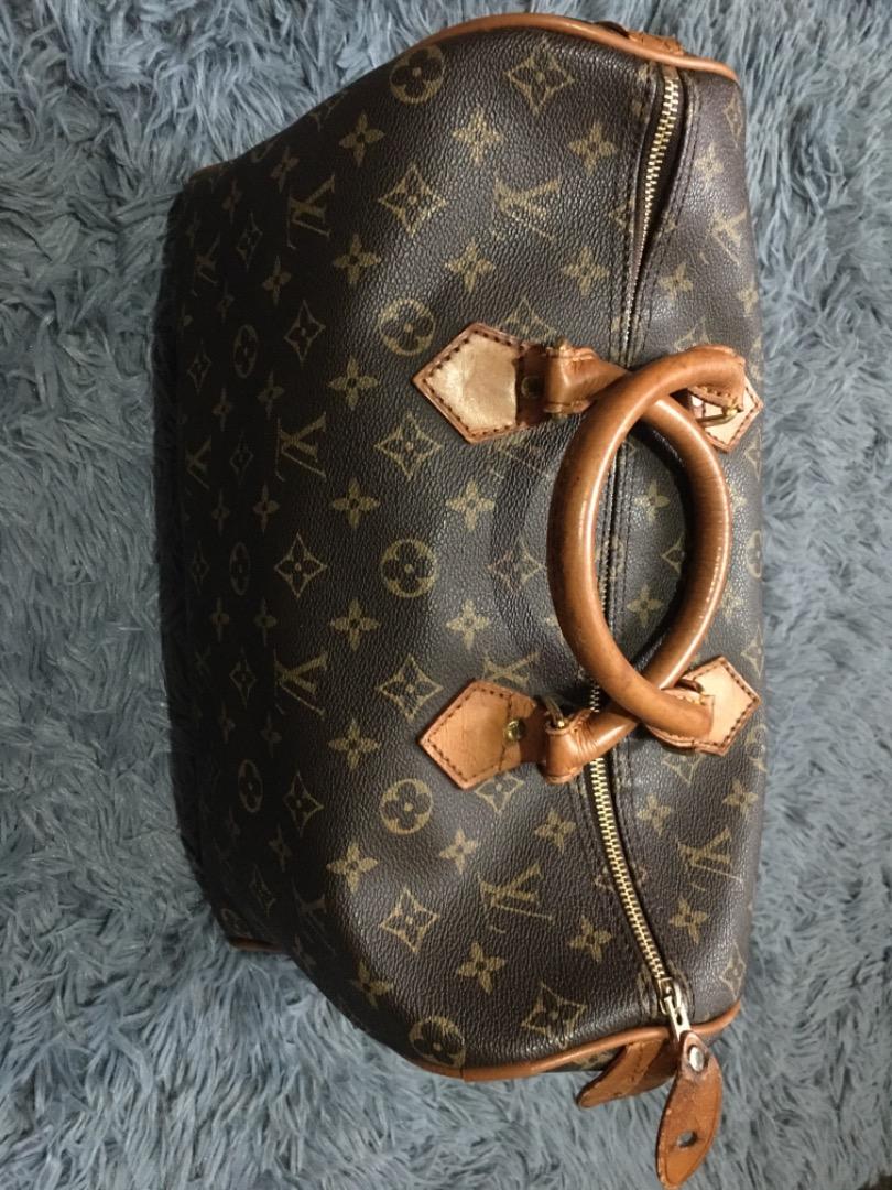 LV Speedy 35 coded (Category: Luxury Bags & Wallets) located in Puerto Princesa. Submitted by Megz2303-56298 (Listing ID 1177340666, Image 2). Description: Speedy 35 LV searchable code well loved and in still in good condition handles and piping are all intact and in good condition with signs of use (see pictures of zipper leaf) L: 13 in, H: 9 in, W: 7 in note: zipper leaf needs repair .