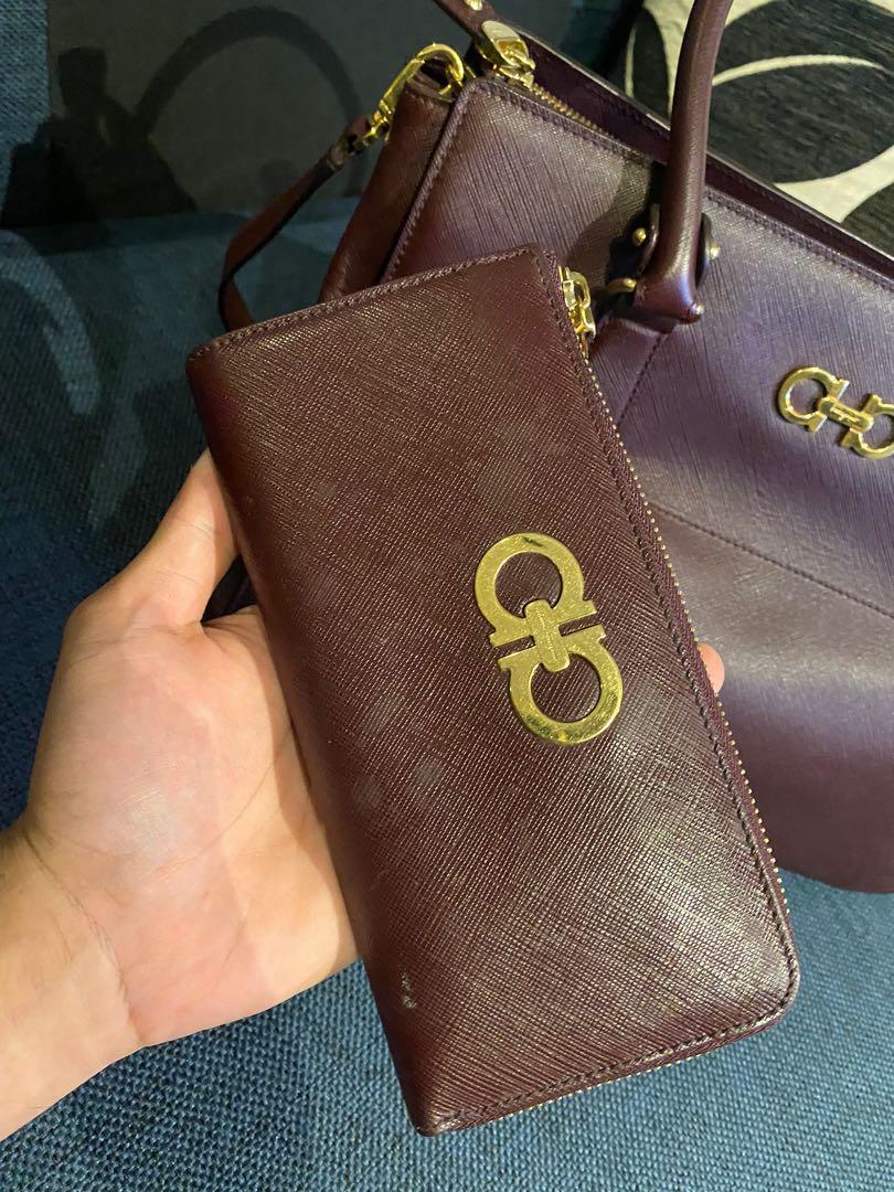 Salvatore Ferragamo bag with wallet (Category: Luxury Bags & Wallets) located in Pasig City. Submitted by chris1776 (Listing ID 1177373293, Image 2). Description: For sale is a Salvatore Ferragamo handbag Maroon/burgundy color 9-9.5 condition Rarely used Bought the bag from Shangri-la Mall for 91k Bought the wallet from Shangri-la Mall for 31k Selling the bag with wallet for only 50k No more last price, good deal! With reciepts as well 100% legit