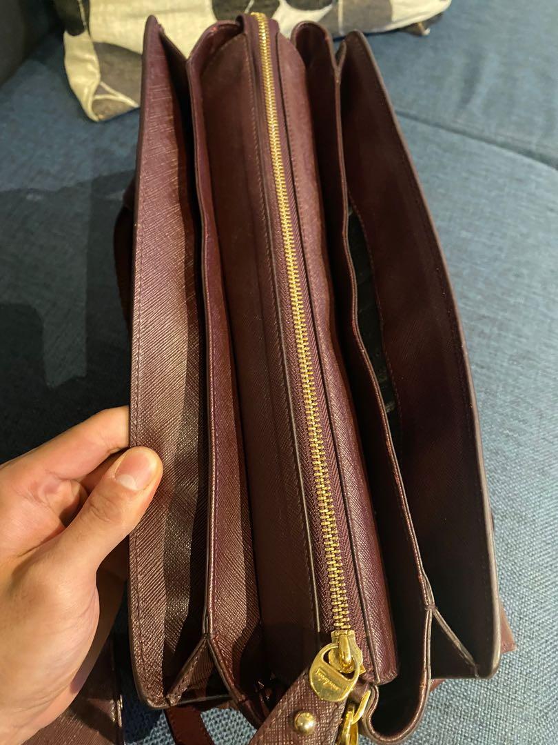 Salvatore Ferragamo bag with wallet (Category: Luxury Bags & Wallets) located in Pasig City. Submitted by chris1776 (Listing ID 1177373293, Image 3). Description: For sale is a Salvatore Ferragamo handbag Maroon/burgundy color 9-9.5 condition Rarely used Bought the bag from Shangri-la Mall for 91k Bought the wallet from Shangri-la Mall for 31k Selling the bag with wallet for only 50k No more last price, good deal! With reciepts as well 100% legit