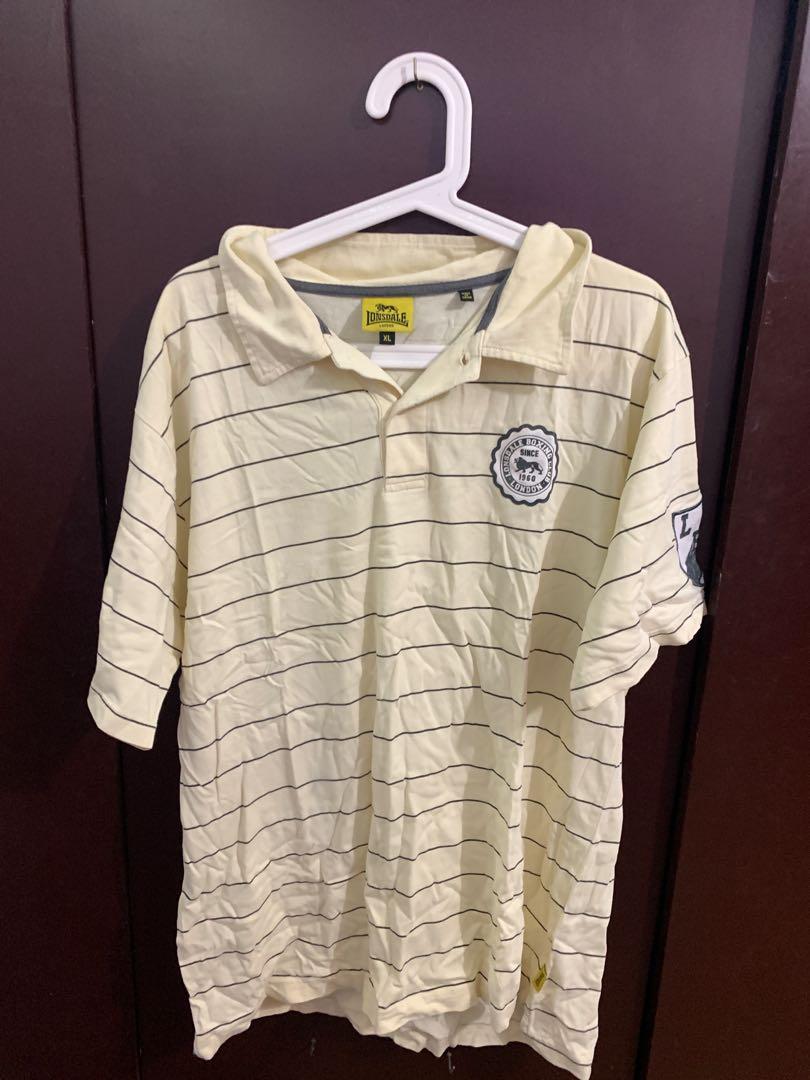 Beige LONSDALE Polo Shirt (Category: Tshirts & Polo Shirts ) located in Makati City. Submitted by thelevatron (Listing ID 1177527995, Image 1). Description: Beige LONSDALE Polo Shirt Size: XL on tag (21x27) Condition: 9/10 Price: PHP 150 + SF.
