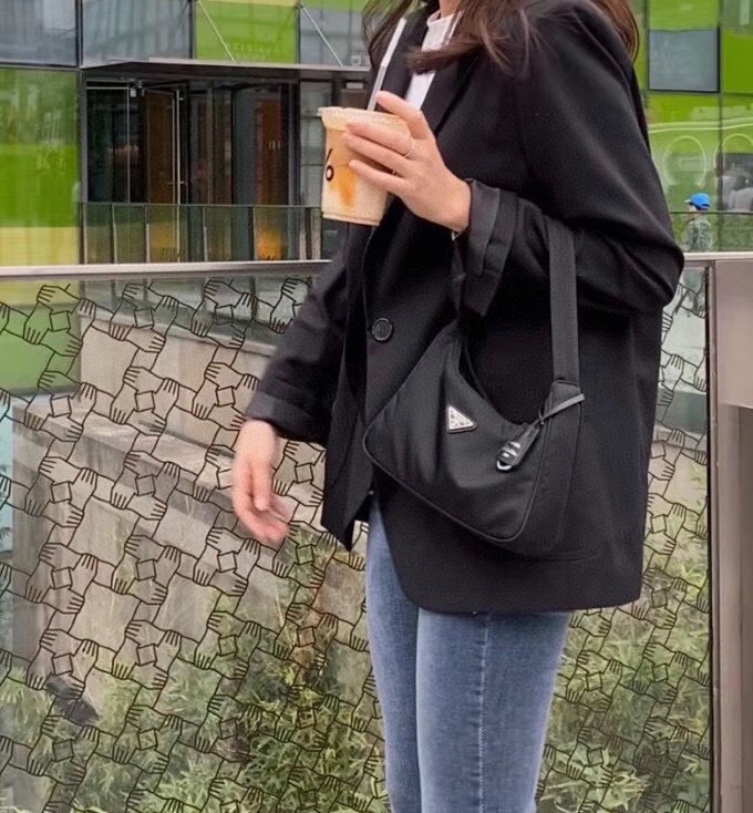 Celebrities with sales prada nylon bag