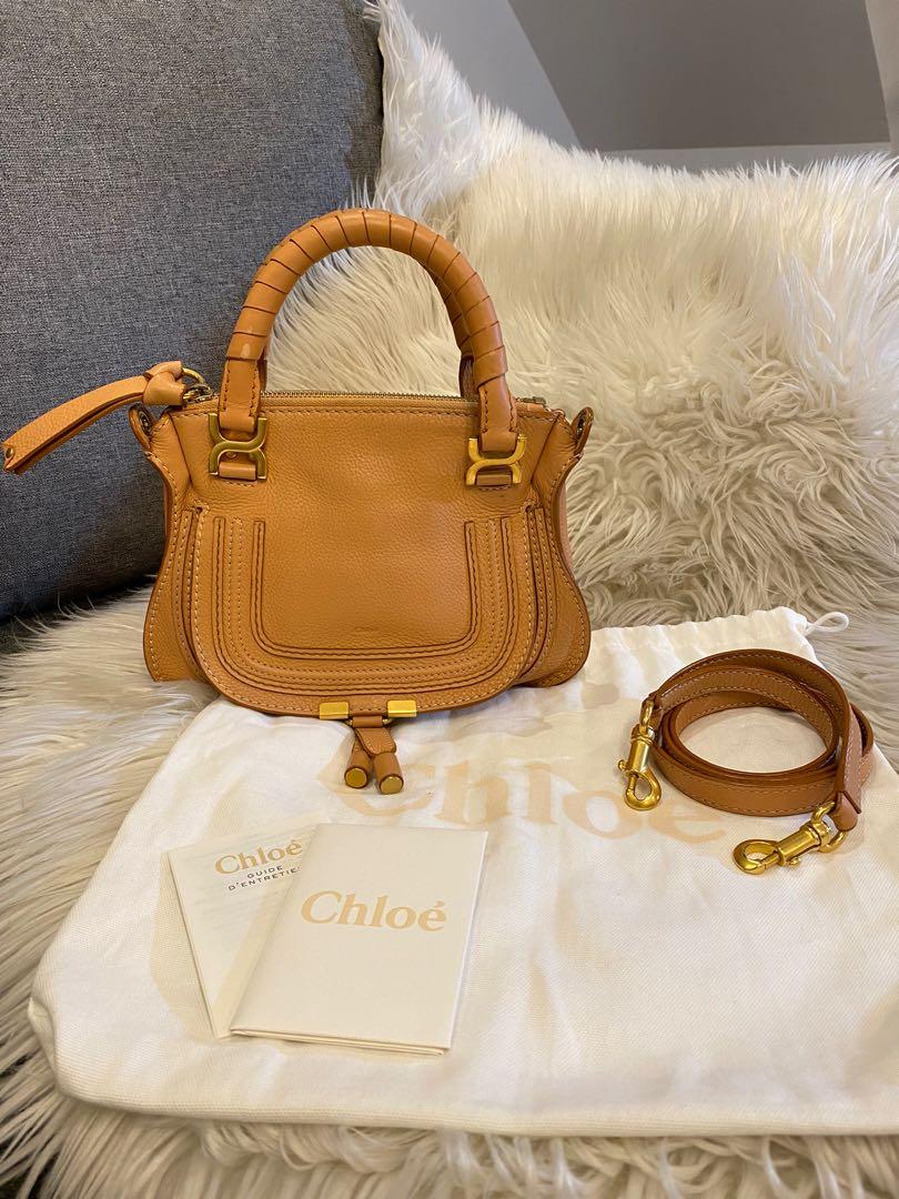 Rare Chloe Marcie Mini in Salmon (Category: Luxury Bags & Wallets) located in Quezon City. Submitted by christineboller (Listing ID 1177648715, Image 1). Description: RARE Chloe Mini Marcie in Salmon. In 9.5/10 condition, no issue on edges, clean interior smells new. Only issue: Tiny mark of GHW hardware on the back portion, tiny spot of white on handle not visible in the eye (as shown in photo). Complete with care booklet, tag and strap in Seria