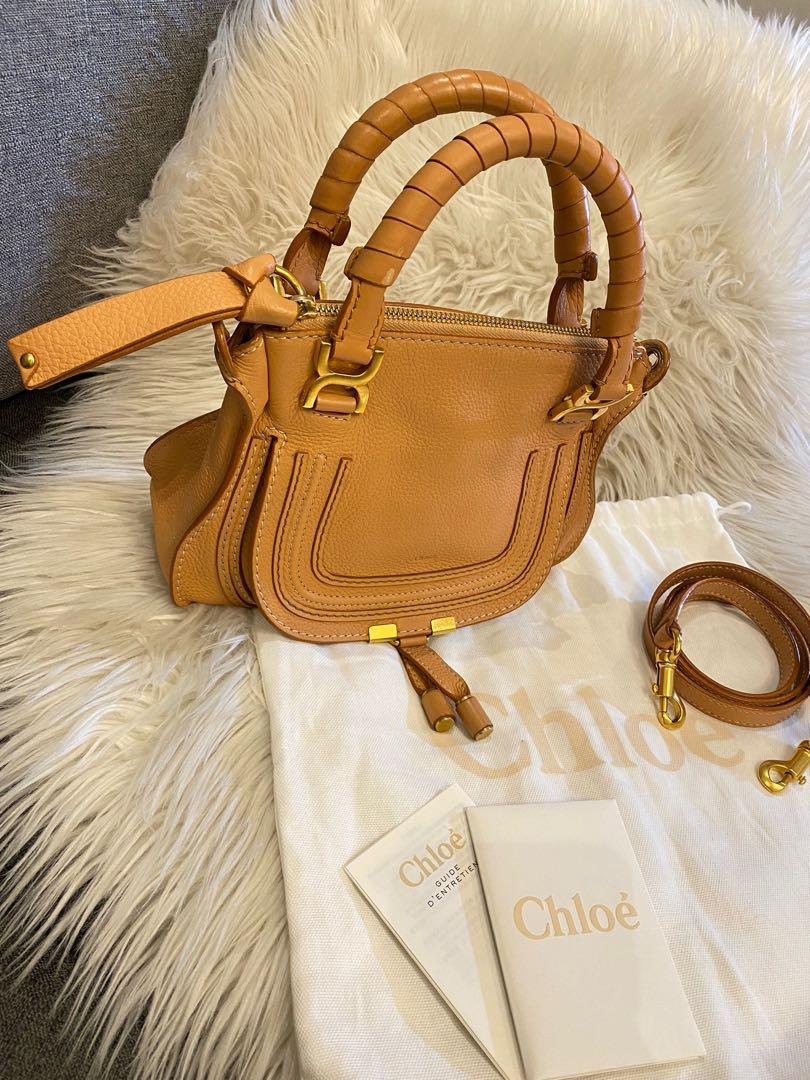 Rare Chloe Marcie Mini in Salmon (Category: Luxury Bags & Wallets) located in Quezon City. Submitted by christineboller (Listing ID 1177648715, Image 2). Description: RARE Chloe Mini Marcie in Salmon. In 9.5/10 condition, no issue on edges, clean interior smells new. Only issue: Tiny mark of GHW hardware on the back portion, tiny spot of white on handle not visible in the eye (as shown in photo). Complete with care booklet, tag and strap in Seria