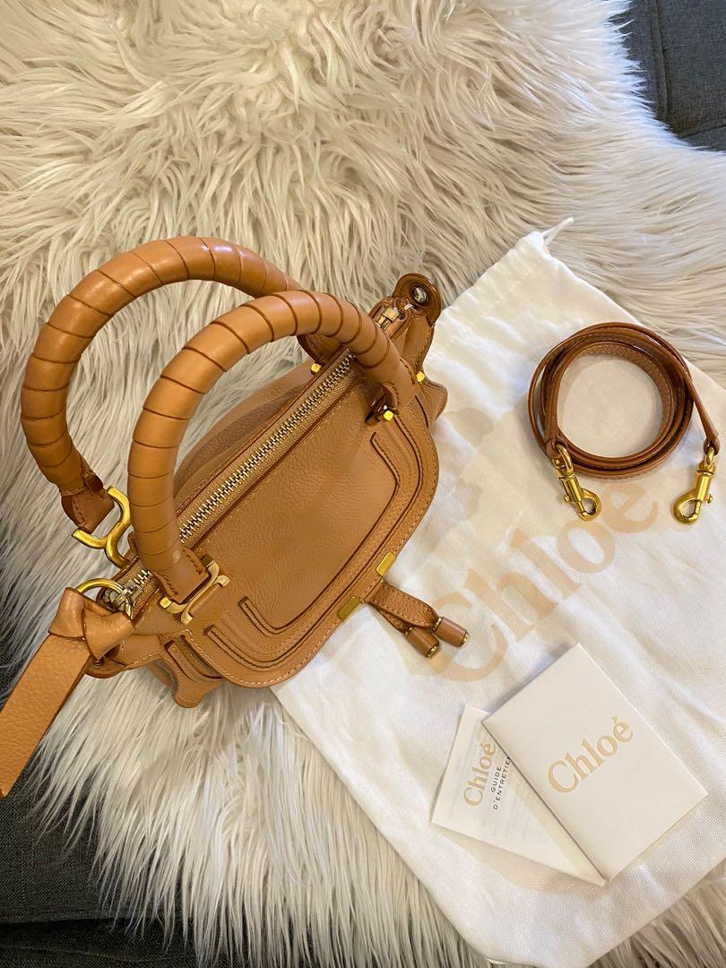 Rare Chloe Marcie Mini in Salmon (Category: Luxury Bags & Wallets) located in Quezon City. Submitted by christineboller (Listing ID 1177648715, Image 3). Description: RARE Chloe Mini Marcie in Salmon. In 9.5/10 condition, no issue on edges, clean interior smells new. Only issue: Tiny mark of GHW hardware on the back portion, tiny spot of white on handle not visible in the eye (as shown in photo). Complete with care booklet, tag and strap in Seria