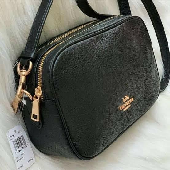 🇺🇲 Authentic Coach Double Zip Camera Crossbody Bag (Category: Cross-body Bags) located in Santa Cruz. Submitted by janelovebagswatchesshoesph (Listing ID 1182110539, Image 3). Description: Refined pebble leather Inside multifunction pocket Double zip closure, fabric lining Outside slip pocket Detachable strap with 22″ drop for shoulder or crossbody wear 9 3/4″ (L) 6 1/4″ (H) x 3 1/2″ (W).