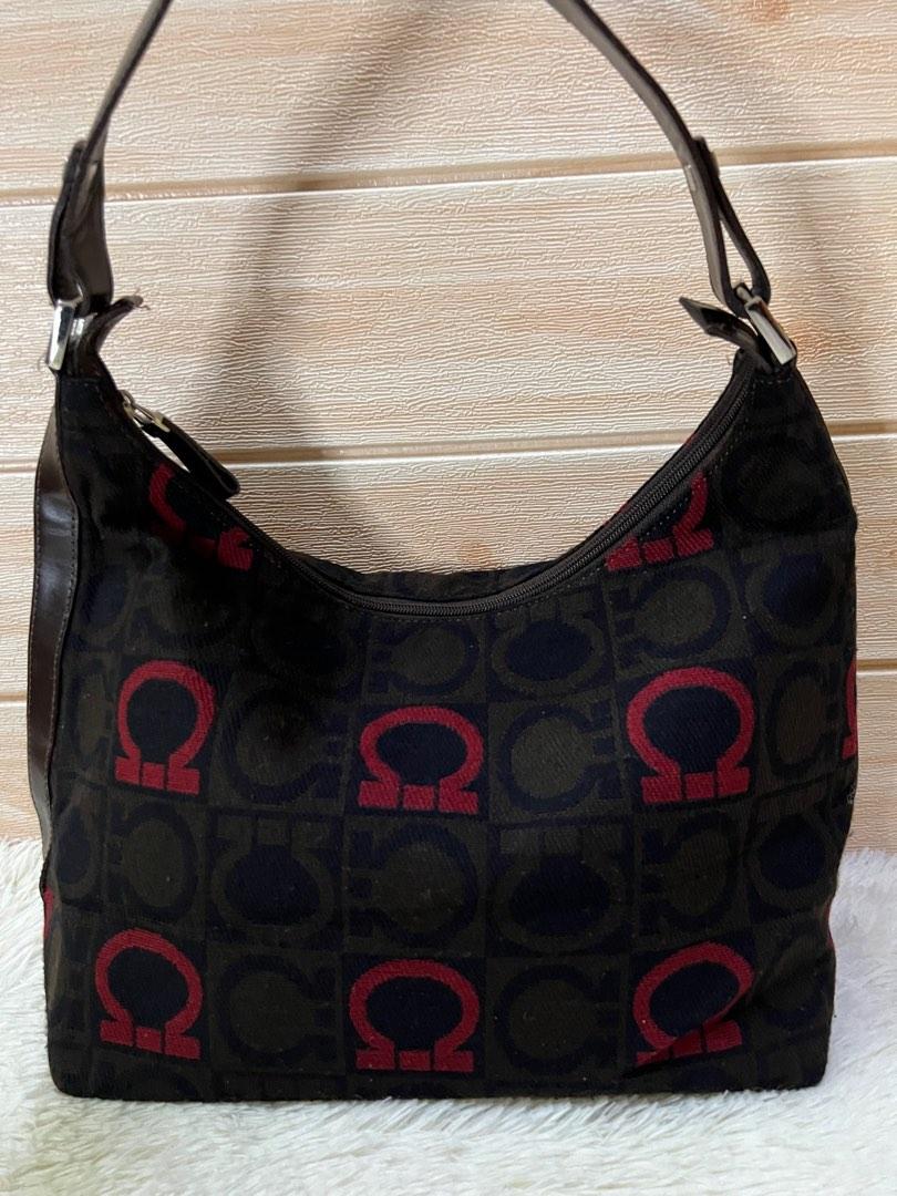 Authentic Ferragamo Hobo Bag (Category: Luxury Bags & Wallets) located in Cagayan de Oro. Submitted by riggstuffs (Listing ID 1182254718, Image 1). Description: Guaranteed Authentic Ferragamo Hobo Bag Made in Italy With code Exterior is of fabric material embossed with the Ferragamo logo No flaws, no rubs or rips of the fabric material Gentle signs of use only Interior is in very good condition, very clean and has a zipper compartment Handles and