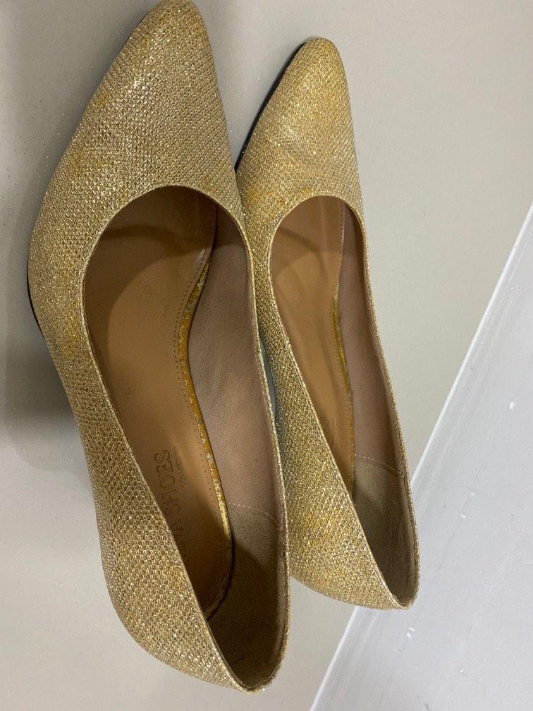 Heels in golden colour cheap