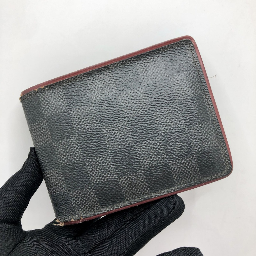 LOUIS VUITTON wallet in leather, some marks of wears.Dim…