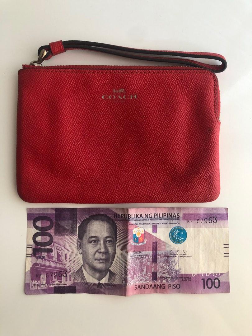 Orig COACH red zip wallet wristlet (Category: Purses & Pouches) located in Pasig City. Submitted by dstarcloset (Listing ID 1182207310, Image 1). Description: •COACH red zip wallet wrislet •Bought in US, sure authentic •Preloved •In good condition •Lightweight •Nice leather quality, it never worn out even if you store in closet for a long time •Texture is smooth, can easily wipe liquid/spills outside of the wallet •I have 2 different designs (see
