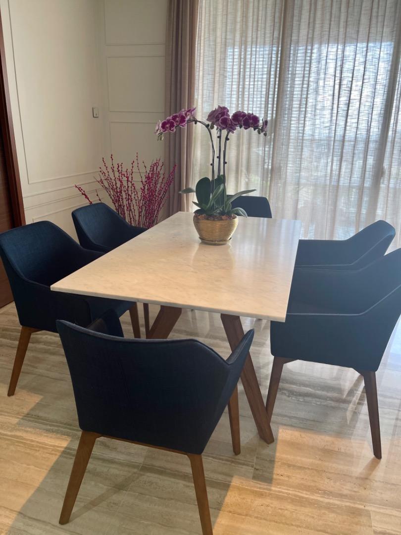 Beautiful Carrara marble top dining table with oakwood table legs and 6