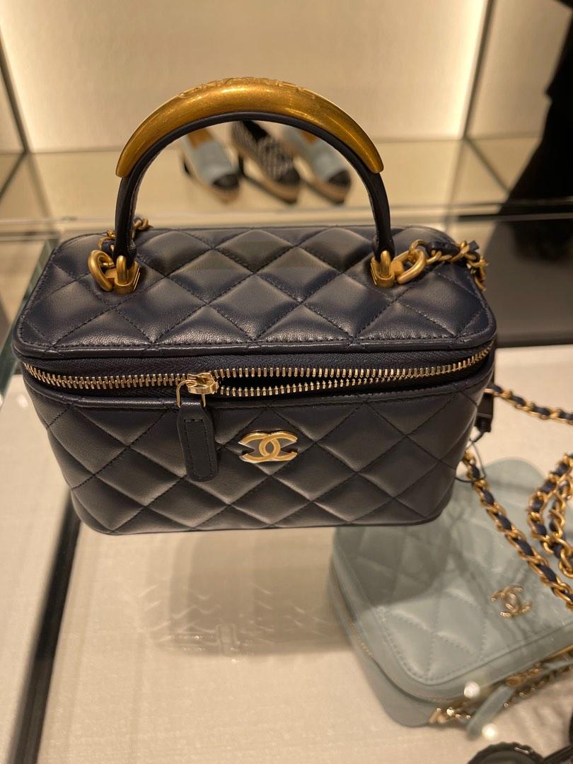 Chanel 22A top handle vanity midnight blue with antique gold metal