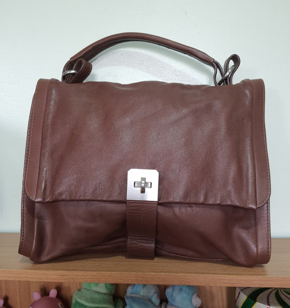 DISSONA Genuine Leather bucket sling bag, Women's Fashion, Bags