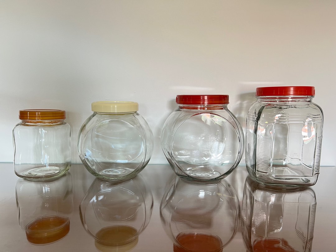 Old glass containers for storage, for housing live fish, plant